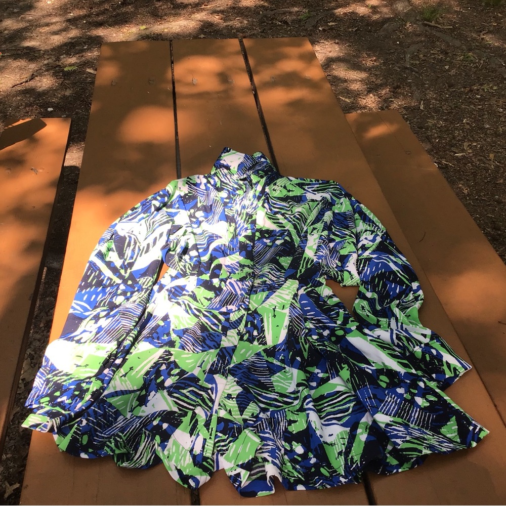 Le Victoria Vibrant Abstract Romper